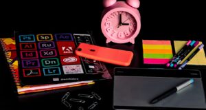 red and black smartphone beside black and red smartphone